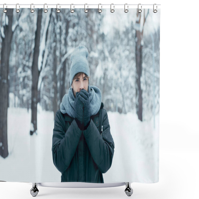 Personality  Portrait Of Young Man Warming Hands Up While Walking In Snowy Park Shower Curtains