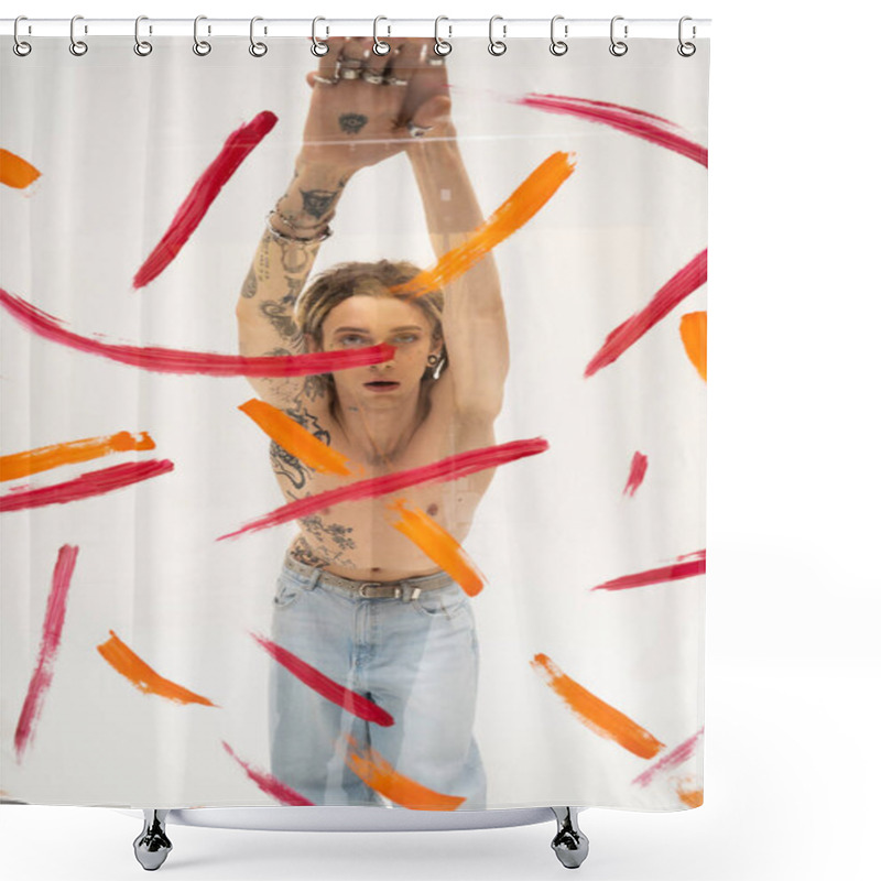 Personality  Shirtless And Tattooed Queer Person In Jeans Standing With Raised Hands Near Glass With Colorful Strokes On White Background Shower Curtains