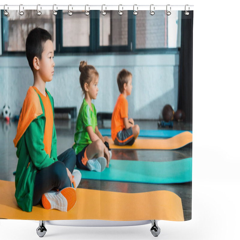 Personality  Selective Focus Of Multicultural Children With Crossed Legs Sitting On Fitness Mats In Sports Center Shower Curtains