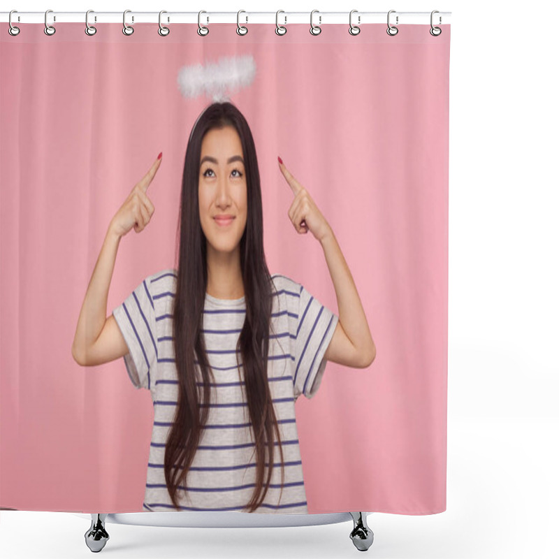 Personality  Portrait Of Shy Modest Asian Girl With Long Brunette Hair In Striped T-shirt Pointing At Angelic Halo Over Her Head, Showing Nimbus And Timidly Smiling. Indoor Studio Shot Isolated On Pink Background Shower Curtains