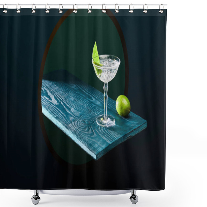 Personality  High Angle View Of Cocktail Glass With Mint Leaf And Whole Lime On Blue Wooden Surface On Geometric Background Shower Curtains