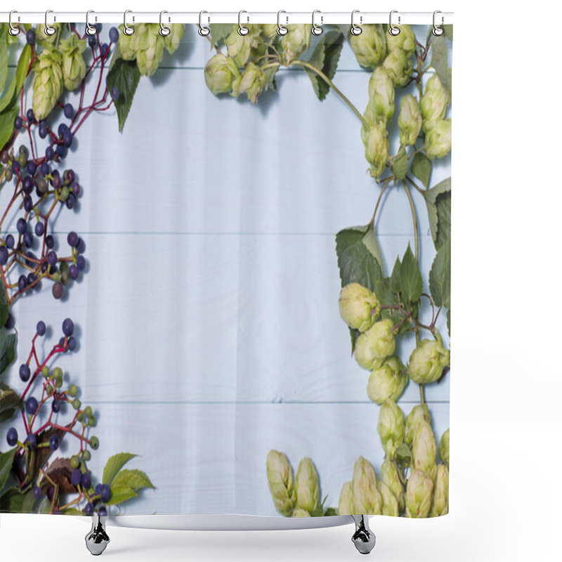 Personality  Frame Made Of Wild Grapes And Fresh Green Hops With Cones With Copy Space On A Blue  Wooden Background Shower Curtains