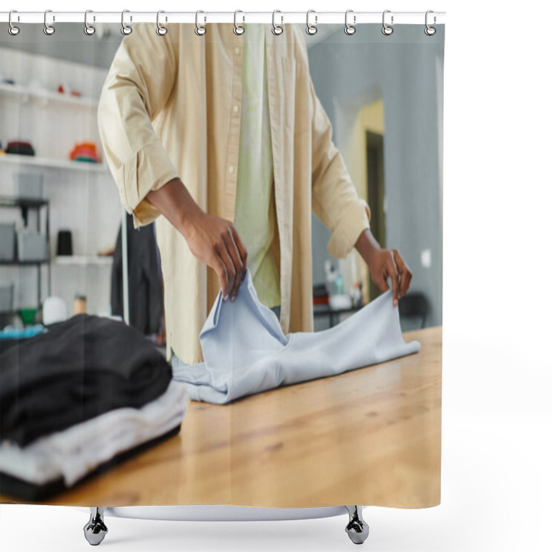 Personality  Partial View Of Diligent Skilled African American Worker Of Print Studio Folding Clothing On Table Shower Curtains