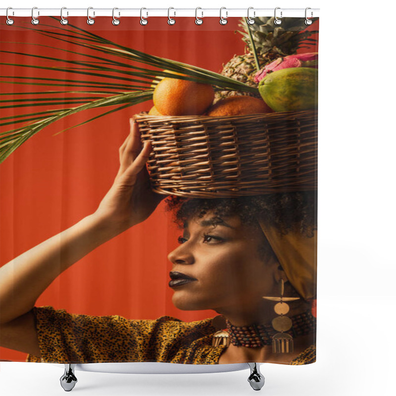 Personality  Portrait Of Young African American Woman Holding Basket With Exotic Fruits On Head And Looking Away On Red Shower Curtains