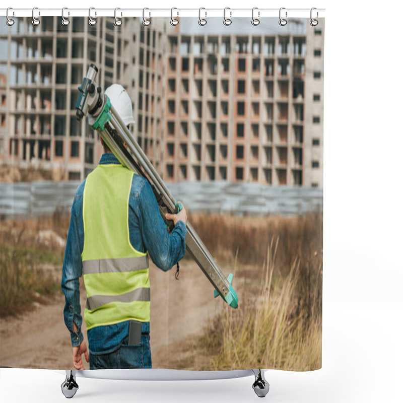 Personality  Rear View Of Surveyor Holding Digital Level With Construction Site At Background Shower Curtains