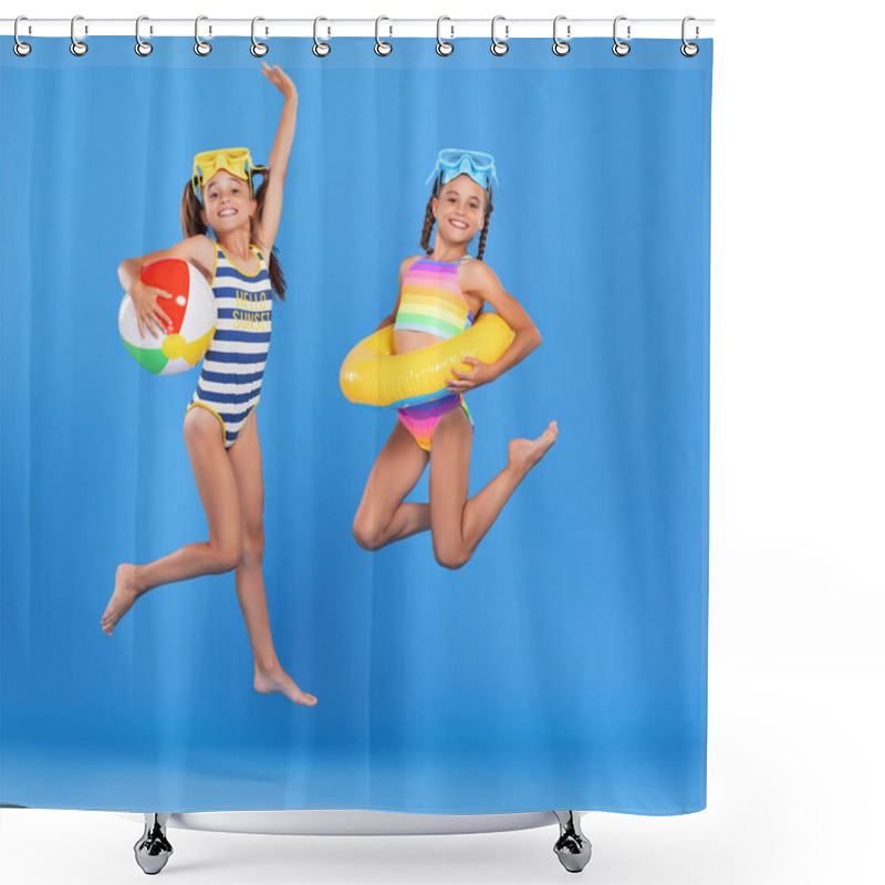 Personality  Two Funny Little Girls Sisters In Swimsuits And Swimming Goggles Jumping Up In Air With Inflatable Swimming Ring And Ball In Hands On Blue Studio Background, Excited And Ready For Summer Sea Vacation Shower Curtains