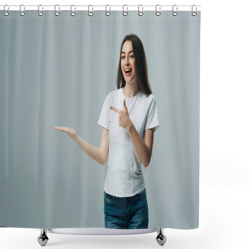 Personality  Beautiful Excited Girl Pointing With Hand And Finger At Copy Space Isolated On Grey Shower Curtains