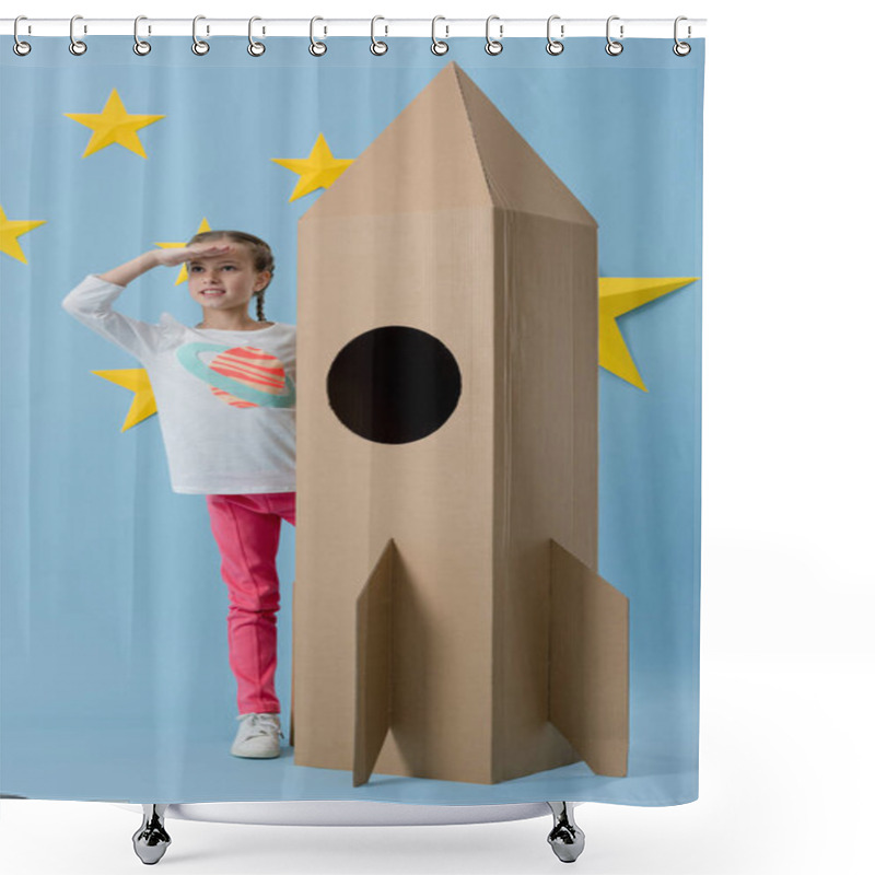 Personality  Cheerful Kid Standing Near Cardboard Rocket And Looking Away On Blue Starry Background Shower Curtains