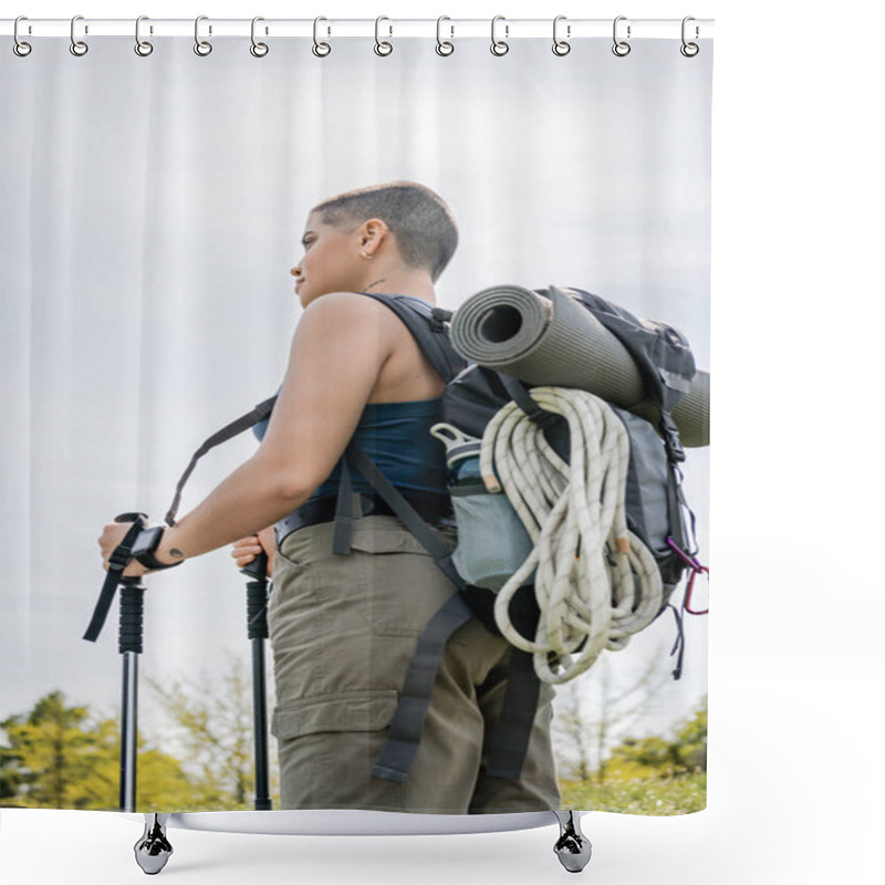 Personality  Low Angle View Of Young Short Haired And Tattooed Female Hiker With Smartwatch And Backpack Holding Trekking Poles And Looking Away With Nature At Background, Solo Hiking Journey Concept  Shower Curtains