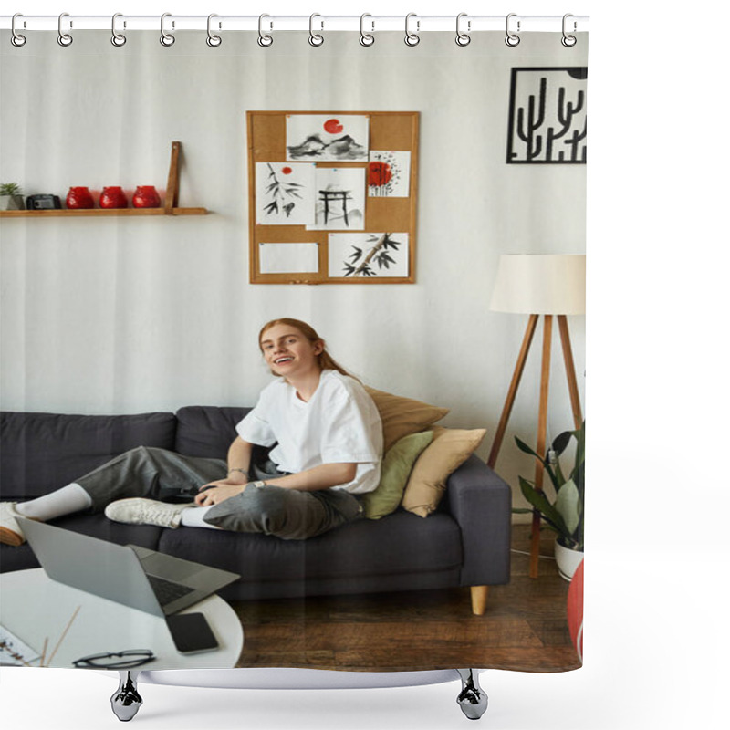 Personality  A Young Man Smiles While Sitting Comfortably On A Couch In A Beautifully Decorated Room. Shower Curtains