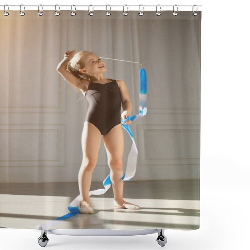 Personality  Beautiful Little Girl In A Swimsuit Standing With A Gymnastics Ribbon And Exercising In The Gym. The Gymnast Stands On White Background. Shower Curtains