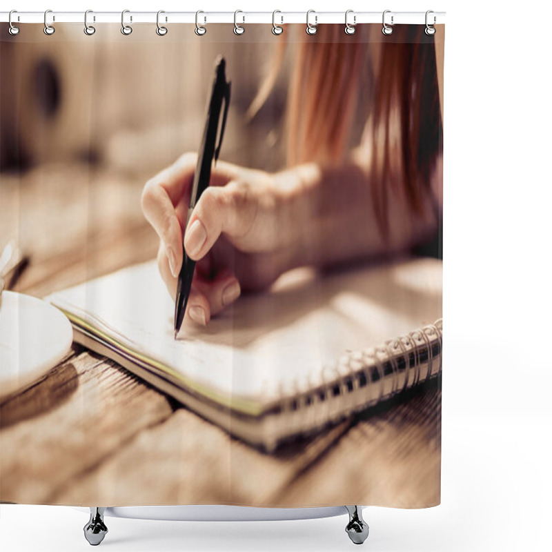 Personality  Close Up View Of Womans Hand Writing With Pen On Notebook On Wooden Table. Shower Curtains