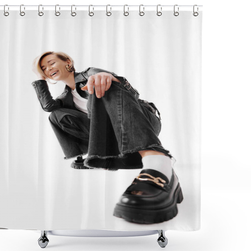 Personality  Full Body Of Young Female In Leather Jacket And Boots Sitting On Haunches On Floor While Hand Touching Hair Against White Background Shower Curtains