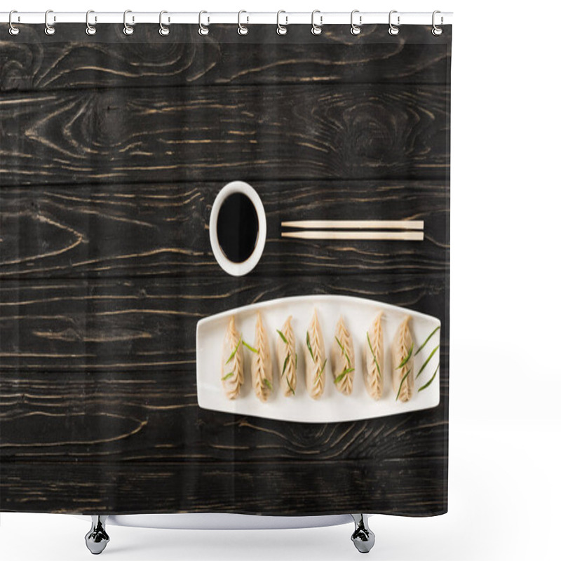 Personality  Top View Of Delicious Chinese Boiled Dumplings On Plate Near Chopsticks And Soy Sauce On Black Wooden Table Shower Curtains