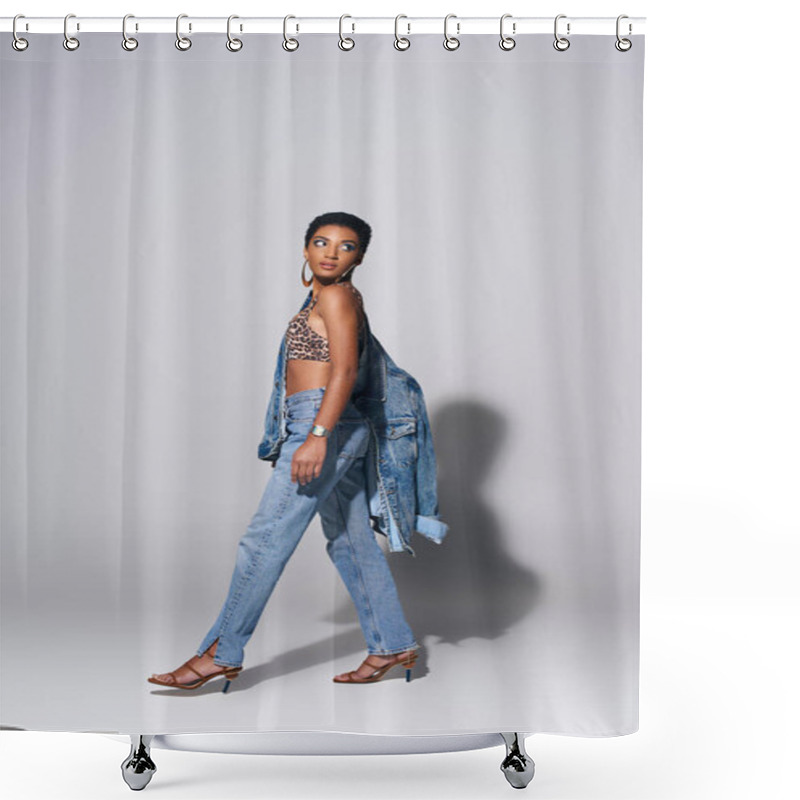 Personality  Full Length Of Modern African American Woman With Golden Earrings Wearing Top With Animal Print, Denim Jacket And Jeans While Walking On Grey Background, Denim Fashion Concept Shower Curtains