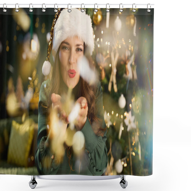 Personality  Christmas Time. Happy Trendy 40 Years Old Housewife With Santa Hat In Green Dress Blowing Tinsel Near Christmas Tree In The Modern Living Room. Shower Curtains