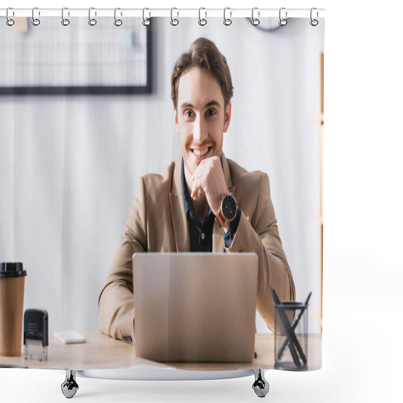 Personality  Smiling Office Worker Looking At Camera While Sitting Near Laptop At Desk In Office On Blurred Background Shower Curtains