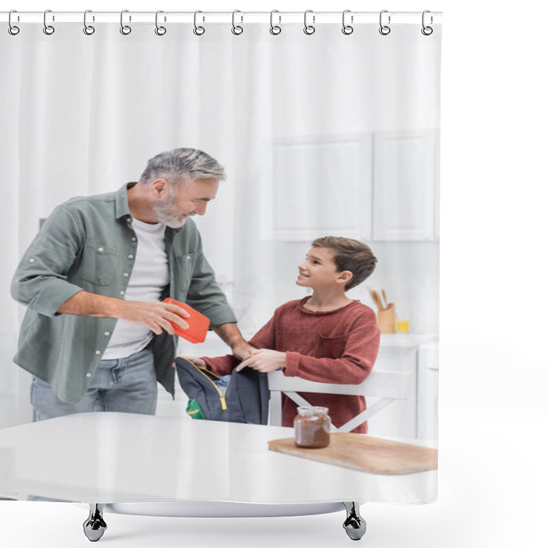 Personality  Grey-haired Man Holding Lunch Box While Packing Backpack Of Smiling Grandson Shower Curtains