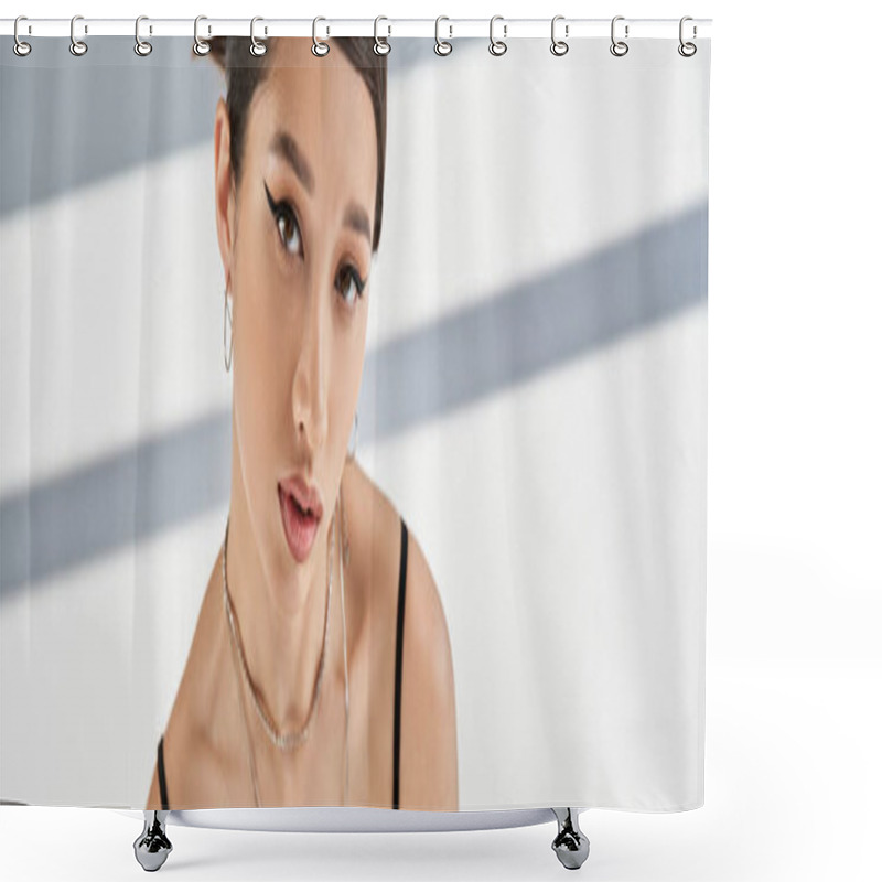 Personality  Portrait Of Charming Asian Woman With Brunette Hair, Bold Makeup, Silver Necklaces And Earrings Looking At Camera On Grey Background With Lighting And Shadows, Banner Shower Curtains