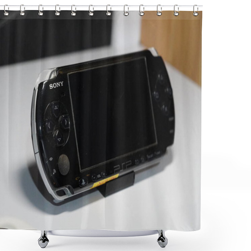 Personality  A Black Handheld Game Console From Sony Called PSP On A White Table Shower Curtains