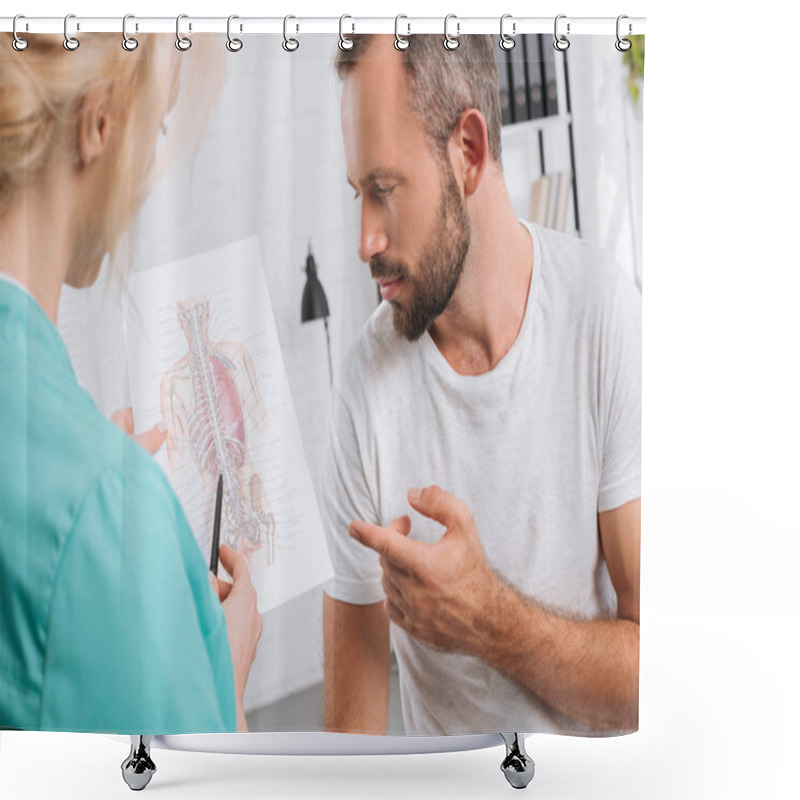 Personality  Chiropractic Showing Human Body Picture To Male Patient During Appointment In Clinic Shower Curtains