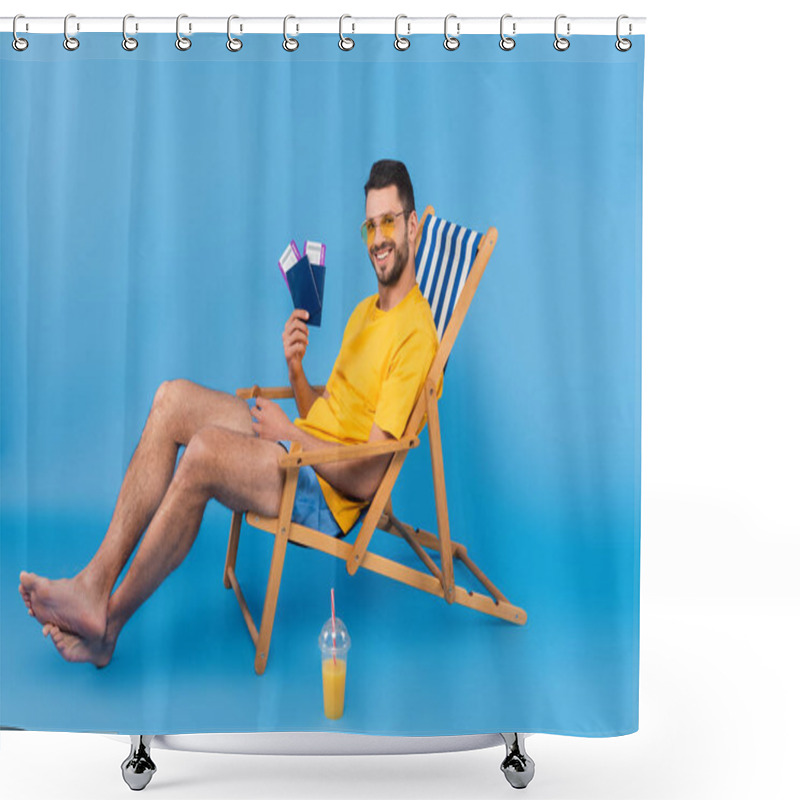 Personality  Smiling Man Holding Passports While Sitting On Deck Chair Near Orange Juice On Blue Background  Shower Curtains