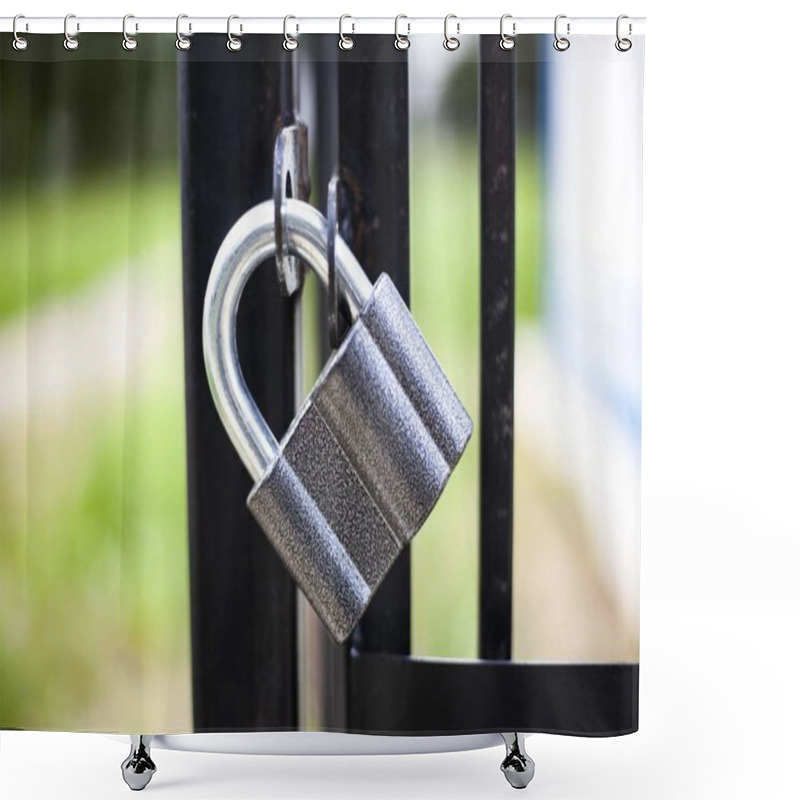 Personality  The Castle Locks The Gate. A Metal Lock Weighs On A Fence. Reliable Property Protection. Reinforced Knee Steel Mount. Guard Your Home. Obstacle For Strangers. Shower Curtains