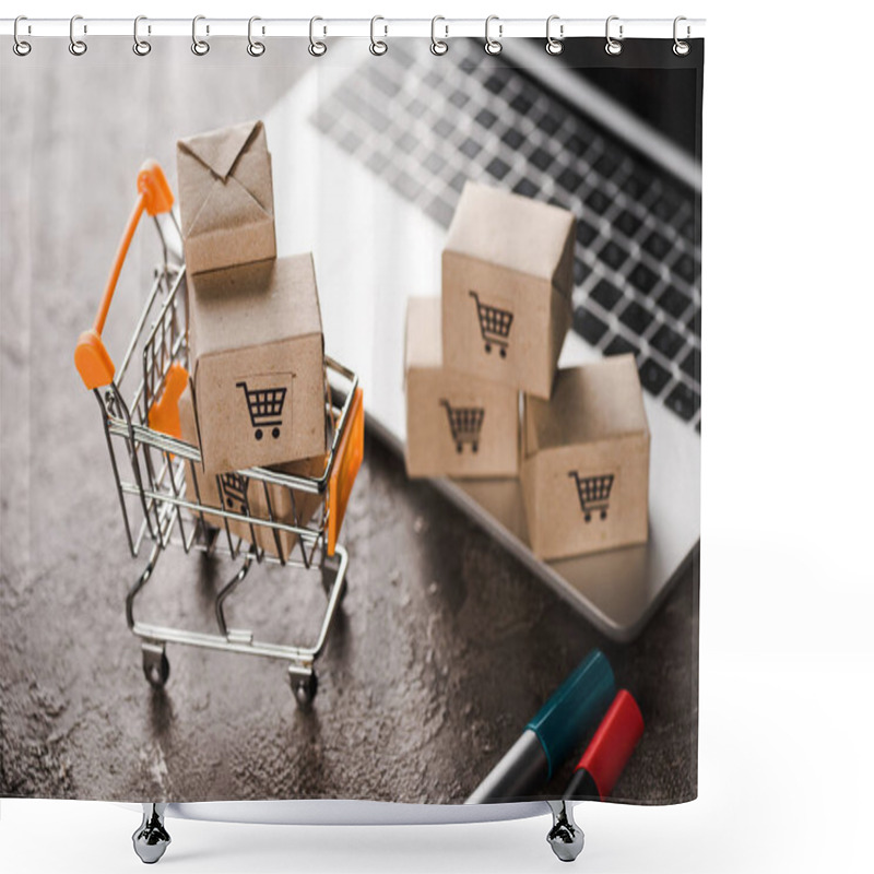 Personality  Selective Focus Of Toy Shopping Cart With Small Carton Boxes Near Laptop, E-commerce Concept Shower Curtains