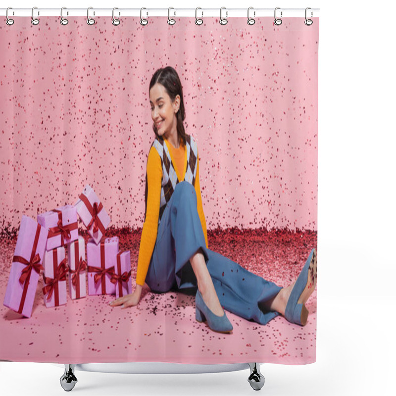 Personality  Full Length Of Joyful Woman In Trendy Clothes Looking At Pile Of Gift Boxes While Sitting Near Confetti On Pink Background Shower Curtains