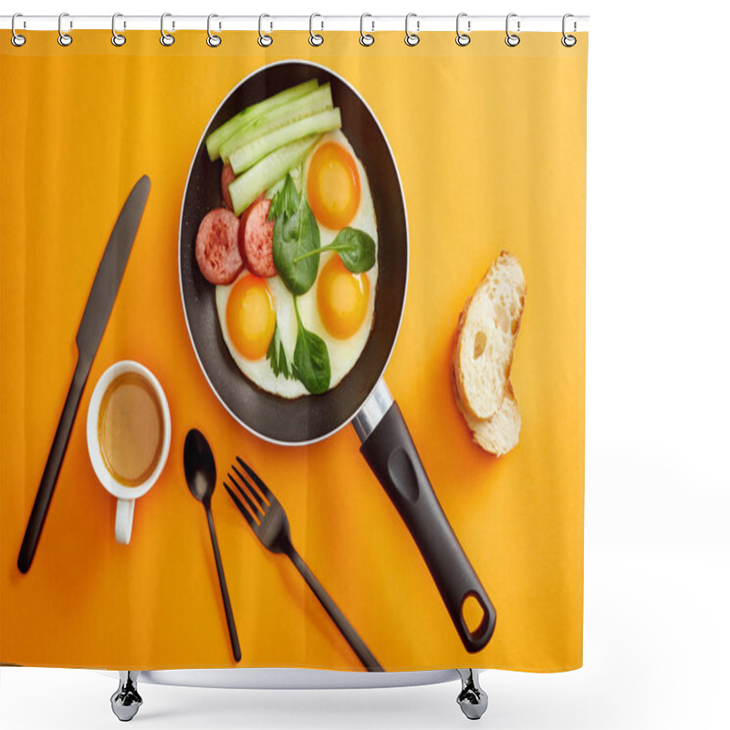 Personality  Top View Of Fried Eggs With Spinach Leaves, Cucumber And Sausage In Frying Pan Near Coffee, Cutlery And Bread On Orange Background Shower Curtains