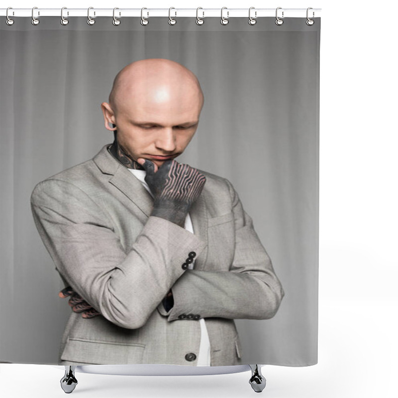 Personality  Young Tattooed Man In Suit Standing With Hand On Chin And Looking Down Isolated On Grey Shower Curtains