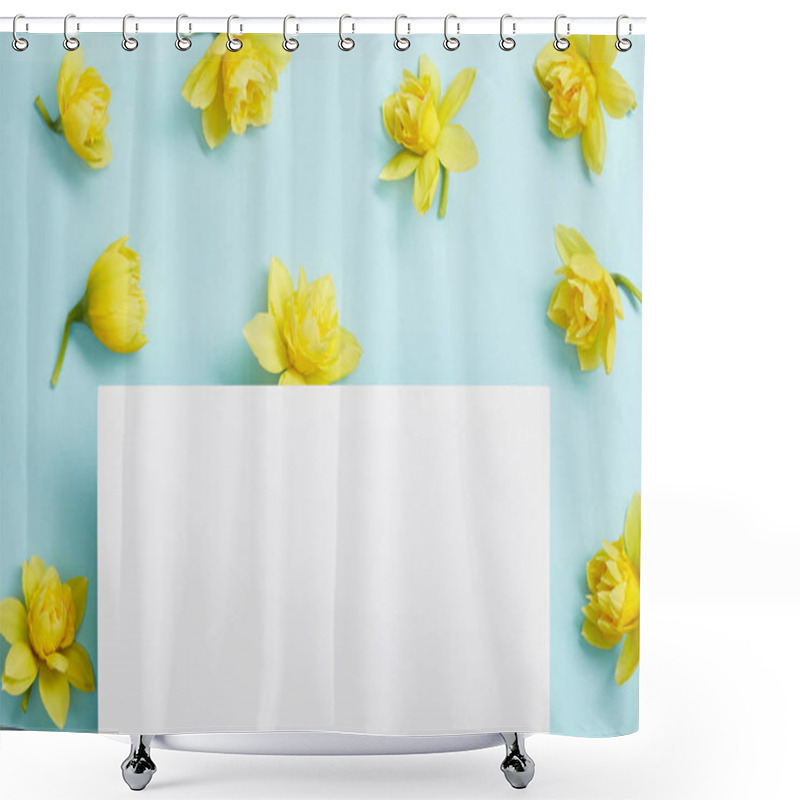 Personality  Top View Of Yellow Narcissus Flowers And White Empty Blank On Blue Background Shower Curtains