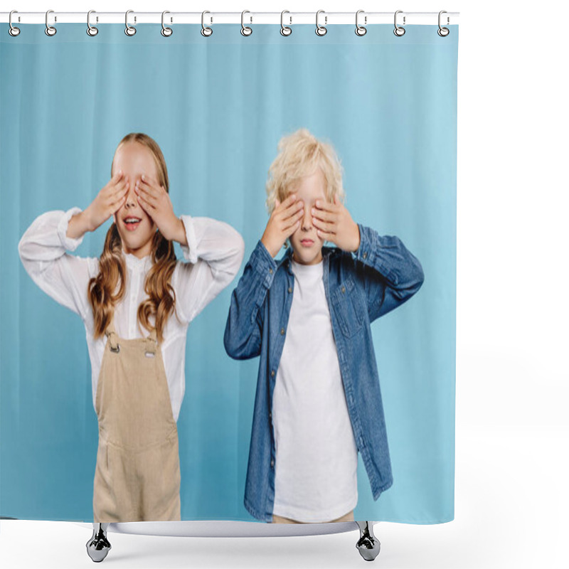 Personality  Smiling Kids Obscuring Faces With Hands Isolated On Blue  Shower Curtains