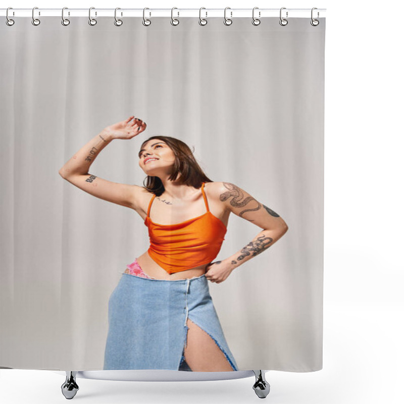 Personality  A Young Woman With Brunette Hair Wearing An Orange Top And Blue Skirt Twirls In A Vibrant Studio Setting. Shower Curtains