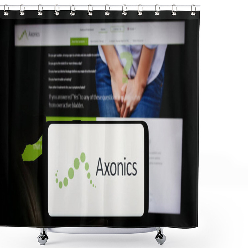 Personality  Stuttgart, Germany - 02-22-2024: Person Holding Mobile Phone With Logo Of American Modulation Technology Company Axonics Inc. In Front Of Web Page. Focus On Phone Display. Shower Curtains