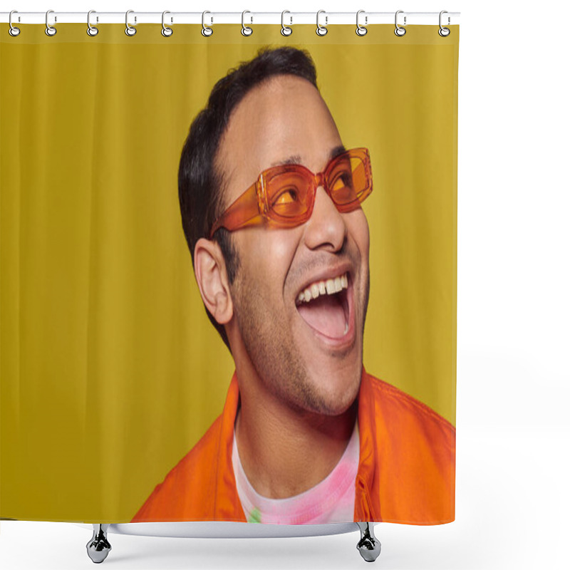 Personality  Positive Indian Man In Orange Sunglasses Looking Away And Smiling On Yellow Background, Side Glance Shower Curtains