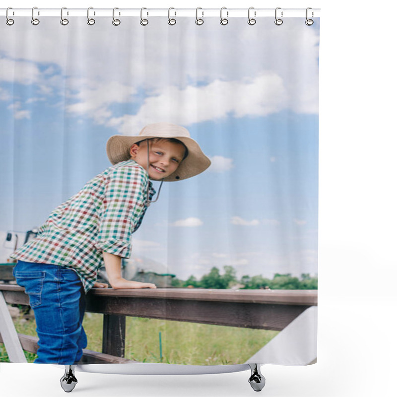 Personality  Cheerful Child In Panama Hat Climbing On Fence And Smiling At Camera On Farm Shower Curtains