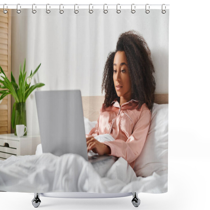 Personality  A Curly African American Woman In Pajamas Sits On A Bed, Absorbed In Working On A Laptop In The Morning. Shower Curtains