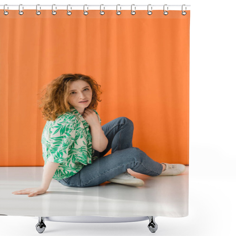 Personality  Young Red Haired Model In Modern Blouse With Floral Pattern And Jeans Looking At Camera While Sitting On Orange Background, Trendy Casual Summer Outfit Concept, Youth Culture Shower Curtains