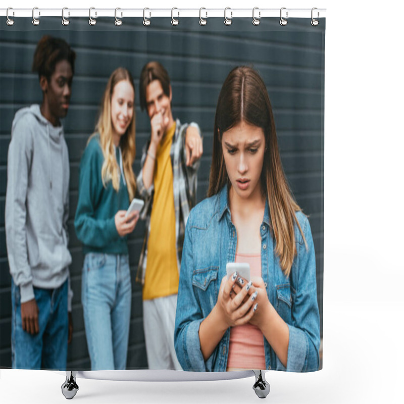 Personality  Selective Focus Of Sad Teenager Holding Smartphone Near Laughing Multiethnic Teenagers Pointing With Fingers Outdoors  Shower Curtains