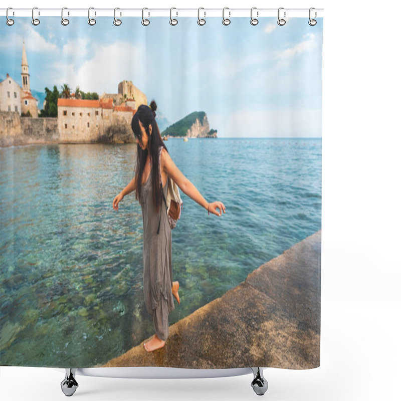 Personality  Woman Walking On Pier Side With Stari Grad (Old Town) On Background In Budva, Montenegro  Shower Curtains