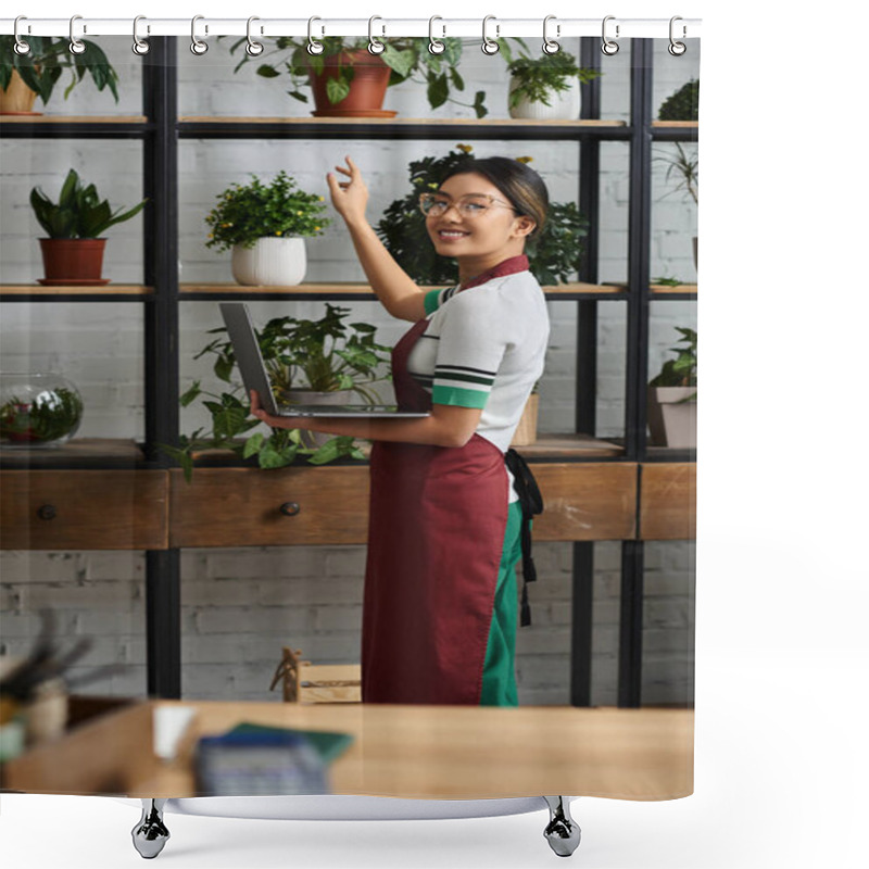 Personality  A Smiling Asian Woman In An Apron Works In Her Plant Shop, Using A Laptop To Manage Her Small Business. Shower Curtains