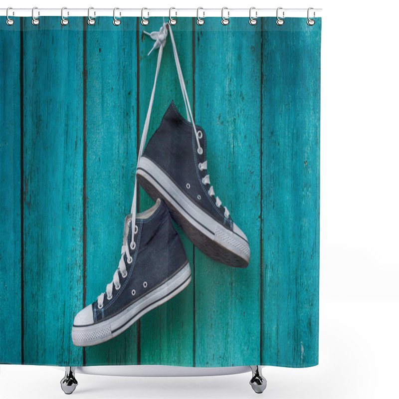 Personality  Pair Of Blue Men's Sports Sneakers Hanging From A Nail On The Wa Shower Curtains