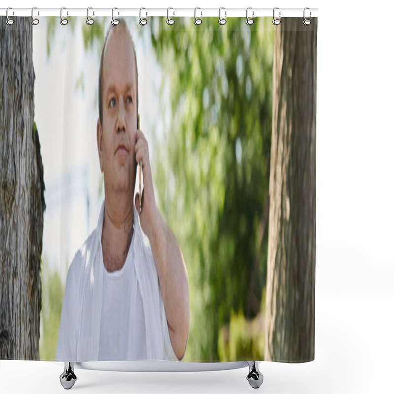 Personality  A Man With Inclusivity In A White Shirt Stands Near A Tree, Looking Contemplative As He Speaks On His Phone. Shower Curtains