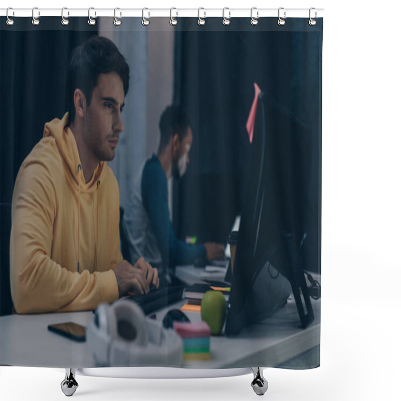 Personality  Selective Focus Of Serious Programmer Looking At Monitor While Working At Night Near African American Friend Shower Curtains