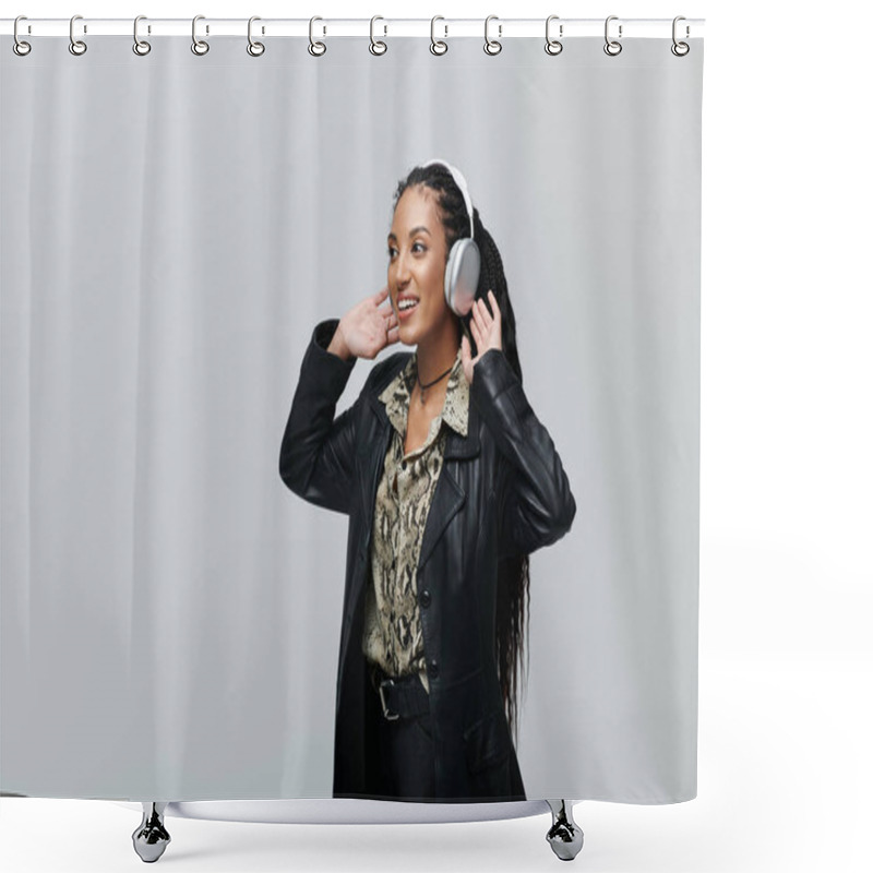 Personality  A Young African American Woman In A Black Leather Jacket And Animal Print Shirt Smiles While Listening To Music With Headphones. Shower Curtains