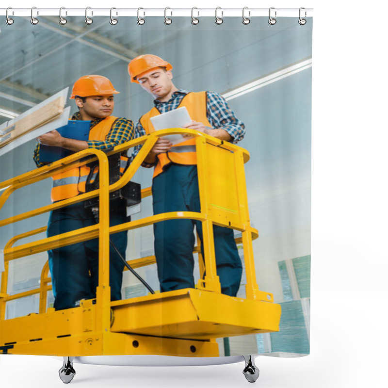 Personality  Concentrated Multicultural Workers With Digital Tablet And Clipboard Standing On Scissor Lift Shower Curtains