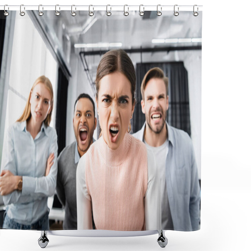 Personality  Aggressive Businesswoman Looking At Camera Near Multiethnic Colleagues On Blurred Background  Shower Curtains