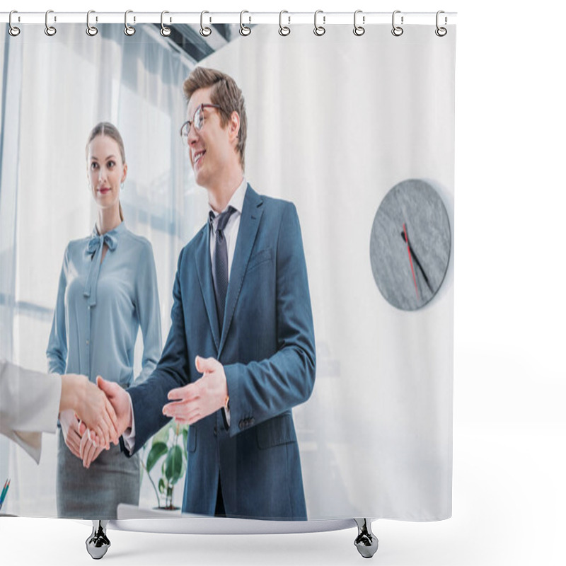 Personality  Low Angle View Of Cheerful Recruiter Shaking Hands With Woman Near Attractive Colleague In Office Shower Curtains