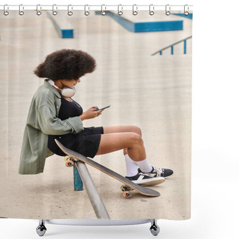 Personality  Young African American Woman With Curly Hair Sits On A Skateboard, Using A Cell Phone At A Bustling Skate Park. Shower Curtains